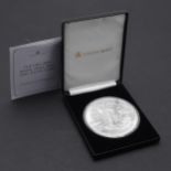 AN ELIZABETH II ROYAL ARMS 10 OZ SILVER COIN, 2021.