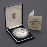 A ROYAL MINT COMMEMORATIVE SILVER PROOF ST HELENA AND ASCENSION ISLAND COIN.