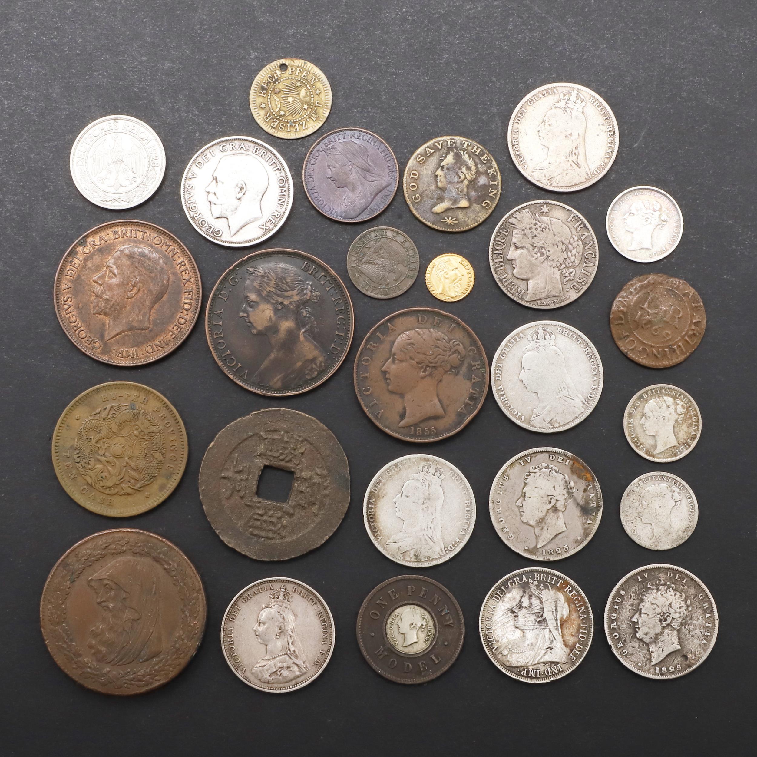 A SMALL COLLECTION OF COINS TO INCLUDE A DRUIDS HEAD PENNY AND OTHERS.