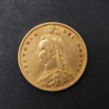 A QUEEN VICTORIA HALF SOVEREIGN, 1887.