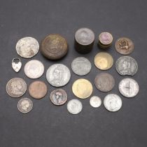 AN INTERESTING COLLECTION OF FAKE COINS AND TWO COIN BOXES.