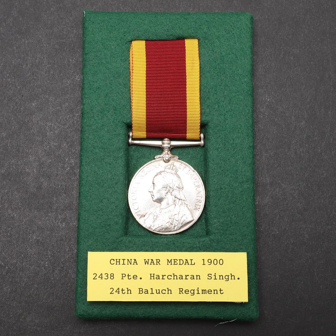 A CHINA WAR MEDAL 1900 TO THE 24TH BALUCH REGIMENT H.M.S. CALCUTTA.