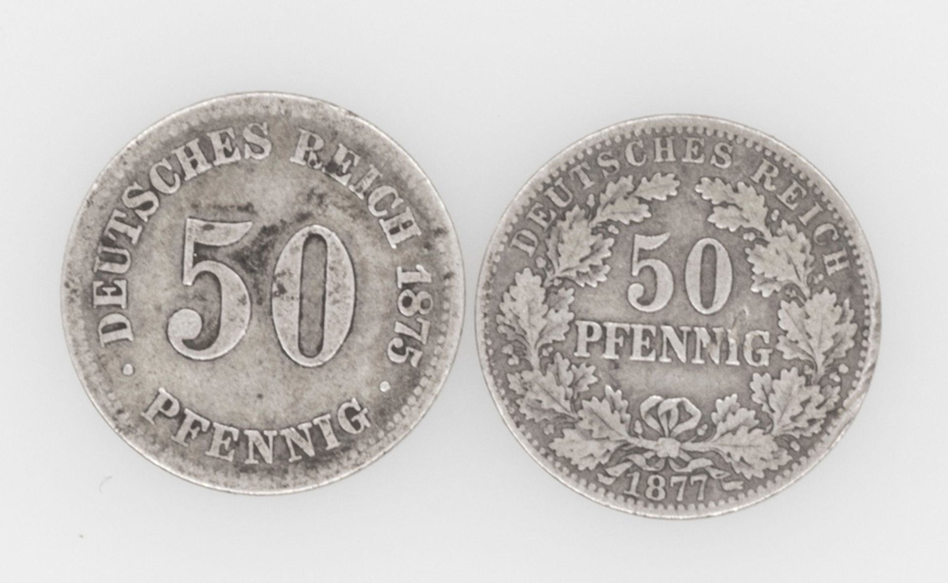 Deutsches Kaiserreich, 2 x 50 Pfennig - Münzen: 1875 B und 1877 J. Erhaltung: ss.