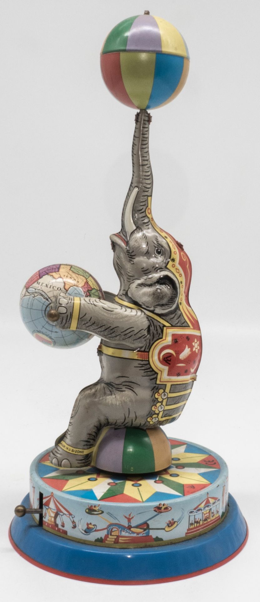Josef Wagner, Elefant mit Globus. Blech. Ohne Schlüssel. Made in U.S. Zone Germany. Höhe: ca. 26