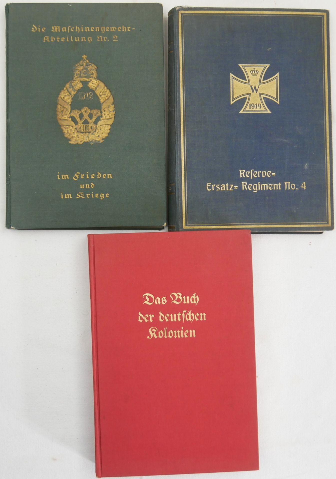 Lot Bücher, insgesamt 3 Stück. Dabei Das Buch der deutschen Kolonien, Reserve - Ersatz - Regiment
