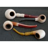 Konvolut Meerschaumpfeifen, insgesamt 4 Stück. Verschiedene Modelle, Schnitzereien und Mundstücke.