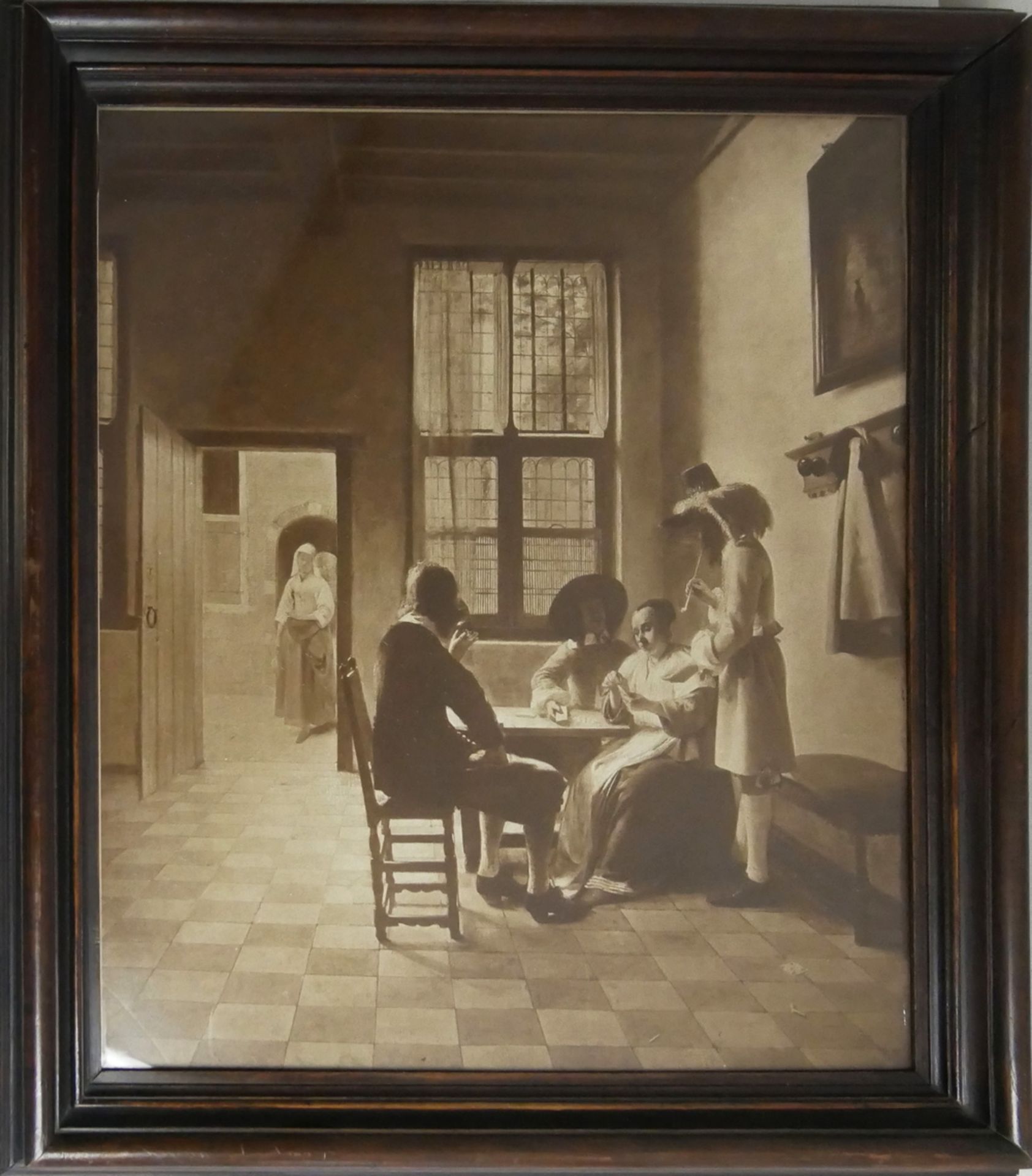 Druck "Die Karten Spieler" nach Pieter De Hooch, hinter Glas gerahmt. Gesamtmaße: Höhe ca. 52,5