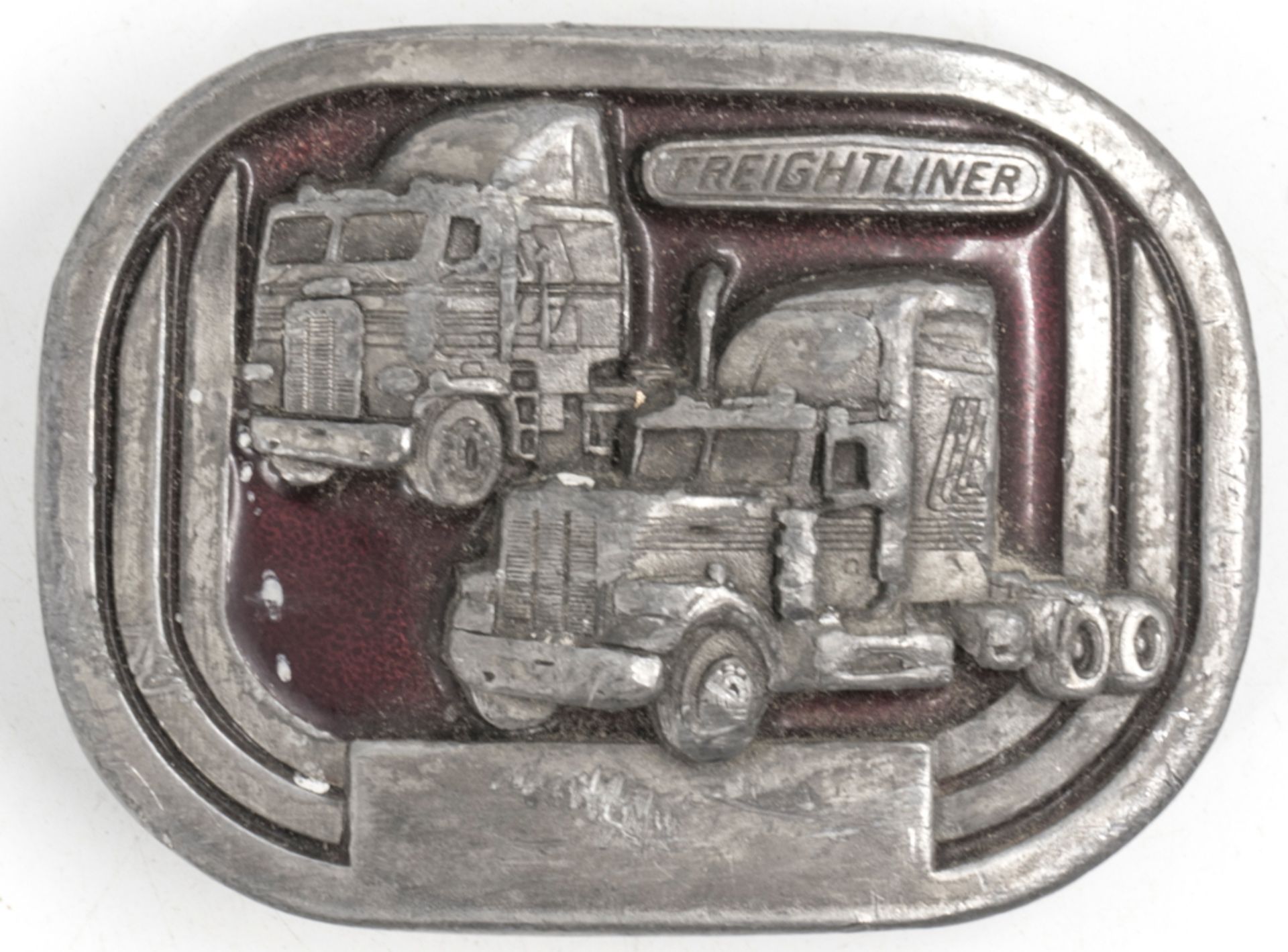 Gürtelschnalle "Freightliner", 1987. Maße: ca. 75 mm x ca. 55 mm.