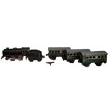 Lot Märklin, bestehend aus Lok R890 sowie 4 Wagons. Gebrauchter Zustand, nicht auf Fehlteile