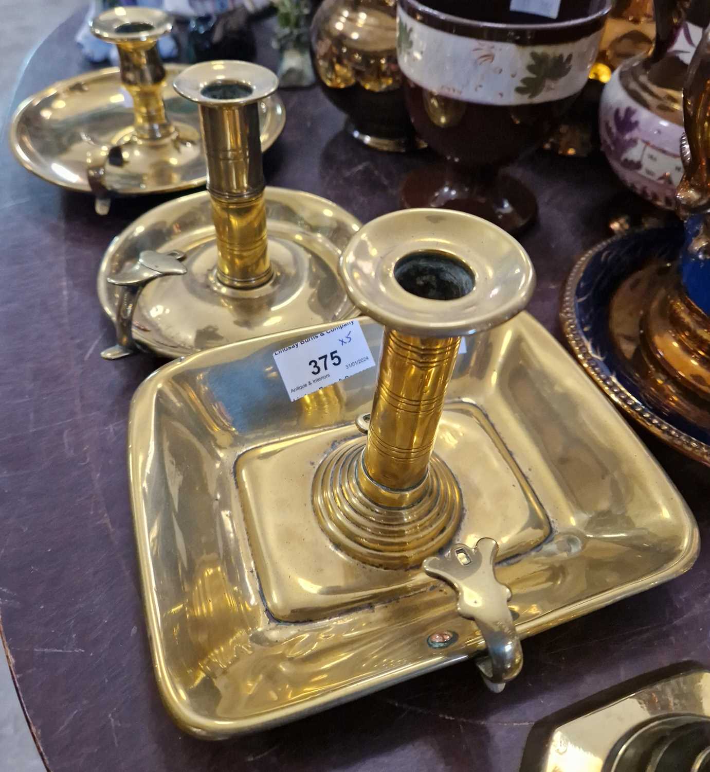 Three assorted brass chamber sticks, together with a pair of brass ejector candle sticks. - Image 2 of 2