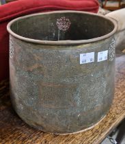 An antique Cairo Ware brass planter of tapered cylindrical form with incised details and pierced