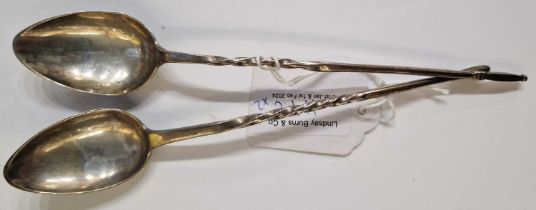 Two antique silver teaspoons with elongated twisted stems, one struck with makers mark 'DI' the