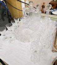 A collection of assorted glassware comprising decanters, glasses and bowl.