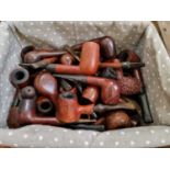 A basket of assorted tobacco pipes to include examples by Jack Miller London, Lorenzo, A. Peterson