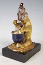 An unusual 19th century gilt bronze, banded agate and lapis lazuli figure of a grotesque bear,