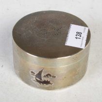 An Eastern silver circular box and cover, the detachable cover inscribed 'May from Barry 1925',