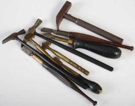 Three vintage hammers and two leather working tools together with four diamond-tipped glass cutters,