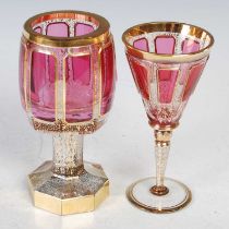 A Venetian glass clear and ruby overlaid octagonal shaped goblet with gilded details, 17cm high,