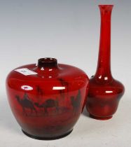 Two Royal Doulton flambé vases, to include a bottle-shaped vase 20.5cm high with printed marks,