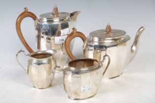 An early 20th century four-piece silver teaset, Sheffield 1936, makers mark of 'S&W', oval
