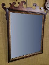 A George III style mahogany fret-cut wall mirror 59cm x 50cm.