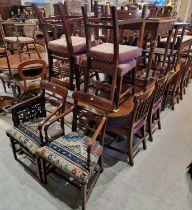 A 19th century mahogany dining table, the central drop leaf section with gate legs and six turned