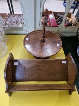 A turned wooden lazy Susan, together with a wooden book rest.