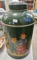 A large antique hand-painted tea canister, the green ground decorated with a Chinese figure and