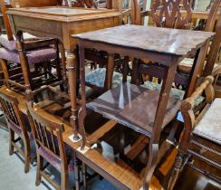 A late 19th century walnut occasional table raised on four turned supports united by a H-shaped