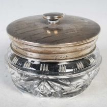 A Birmingham silver mounted Art Deco cut glass dressing table box and cover, the cover with engine