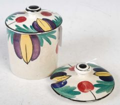 A hand-painted Langtoun Ware pottery preserve jar and cover, together with another similar cover.