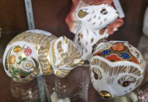 Three Royal Crown Derby animal figures, all with gold buttons, to include 'Bramble', 'Cottage Garden