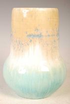 A Ruskin pottery souffle glaze vase, mottled yellow, blue, white and green, stamped marks 'Ruskin'