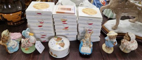 A collection of Beatrix Potter porcelain figures comprising a Beswick Miss Rabbit and Bunnies, a