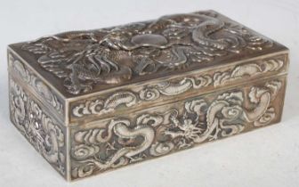 A Chinese silver rectangular box and hinged cover, makers mark of 'Luen Wo', the hinged cover