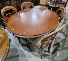 A 19th century mahogany oval snap top table, together with four Victorian mahogany balloon back