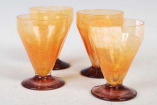 Daum, Nancy, four orange and purple glass conical shaped liqueur glasses, wheel-cut marks, 7.5cm