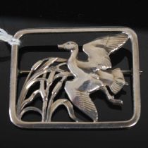 Georg Jensen, a sterling silver brooch of rectangular form, pierced with a duck taking flight