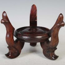 A Chinese dark wood vase/ bowl stand, early 20th century, the circular base section raised on