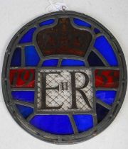 Royal interest: a stained and leaded glass oval panel made to commemorate the coronation of Queen