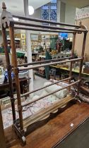 A late 19th century mahogany towel rail with acorn finials.