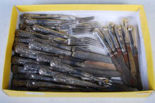Seventeen silver handled forks and knives together with six silver handled afternoon tea knives of