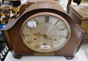 An Art Deco Smiths mantle clock with Roman numeral dial and twin train movement with presentation