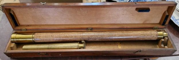 An antique brass and leather bound single draw telescope in two parts, inscribed 'D McGregor,