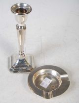 A Birmingham silver candlestick, 15.5cm high, together with a Birmingham silver circular ashtray.