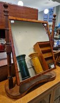 A late 19th century mahogany dressing table mirror with two turned upright supports.