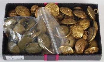 A box of assorted vintage military brass buttons.