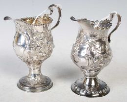 Two George III silver cream jugs, one hallmarked London 1774, makers mark rubbed, 11cm high,