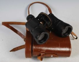 A cased set of 'Barr and Stroud of Glasgow & London' binoculars with 10x magnification.