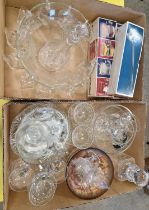 Two boxes of assorted glassware to include a punch bowl, cups, decanters, etc.